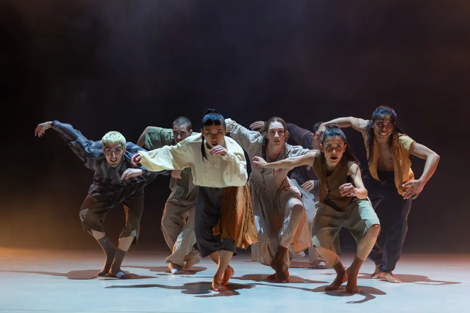 Of Curious Nature dancers reaching forward in A Thousand Steps to Silence